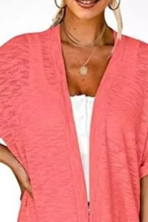 100% polyester Care instructions: Machine wash cold cardigan in Black with relaxed silhouette