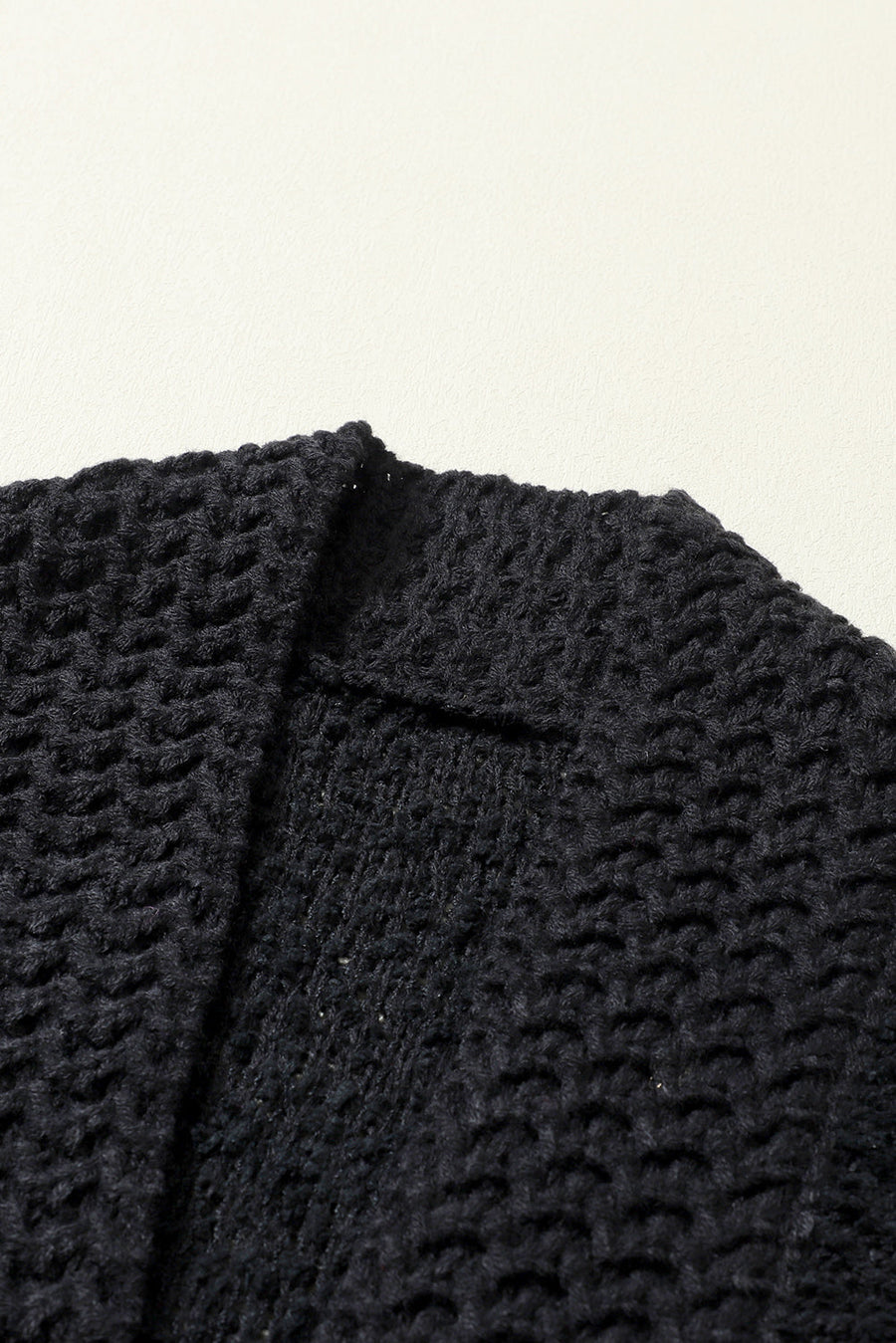 Black textured bouclé knit bolero jacket detail