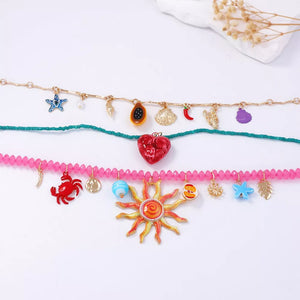 teal necklace featuring 3-piece set and charm