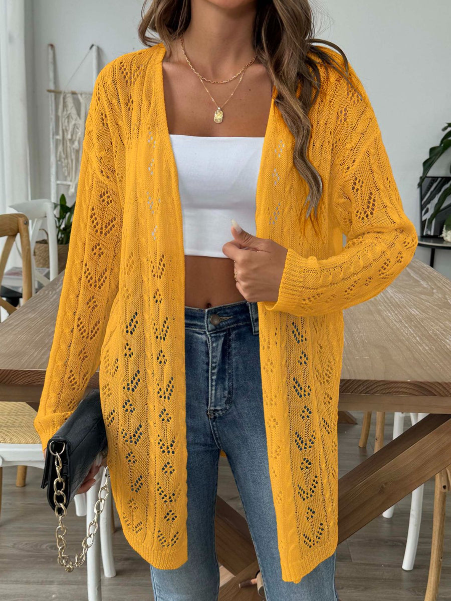 Openwork diamond knit duster cardigan in gold with long sleeves and an open front.