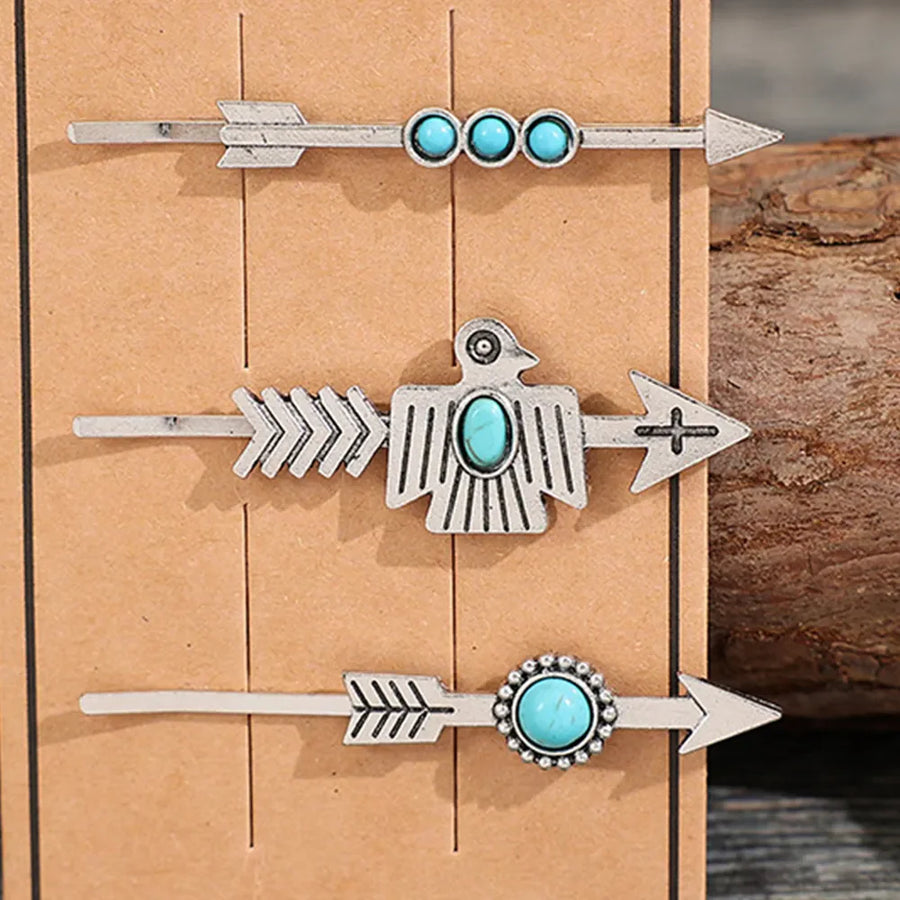 Southwestern hair pins with turquoise accents, featuring arrow, eagle, and beaded designs.