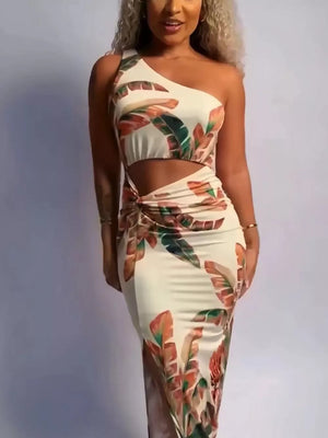 Tropical cutout maxi dress with one shoulder, side slit, and leaf print.