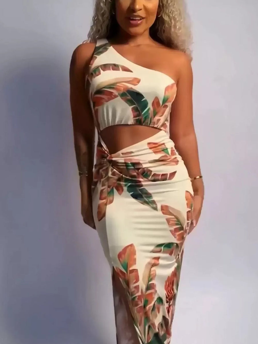 Tropical cutout maxi dress with one shoulder, side slit, and leaf print.