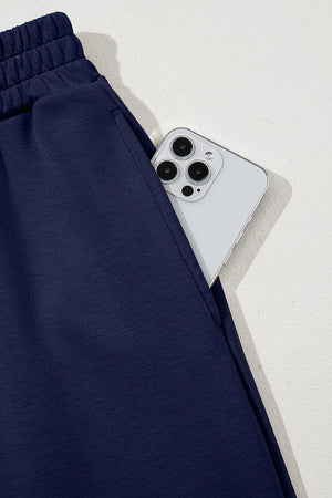 lounge set in Dark Navy with drawstring waist and hip-length