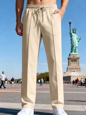straight-leg pants in khaki featuring drawstring and straight fit