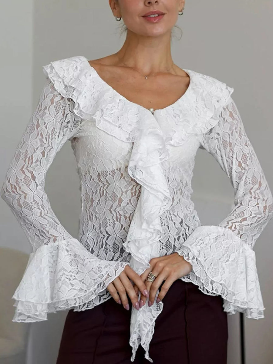 White blouse featuring lace and floral