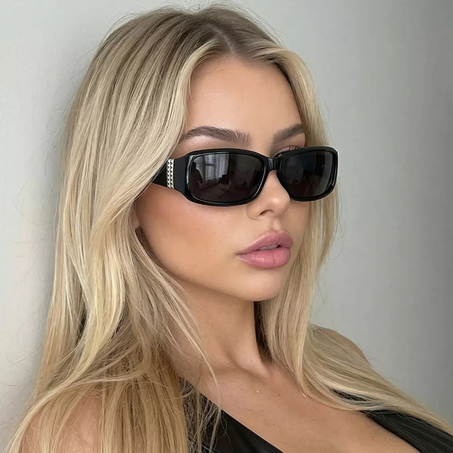 black sunglasses featuring UV protection and leopard-print