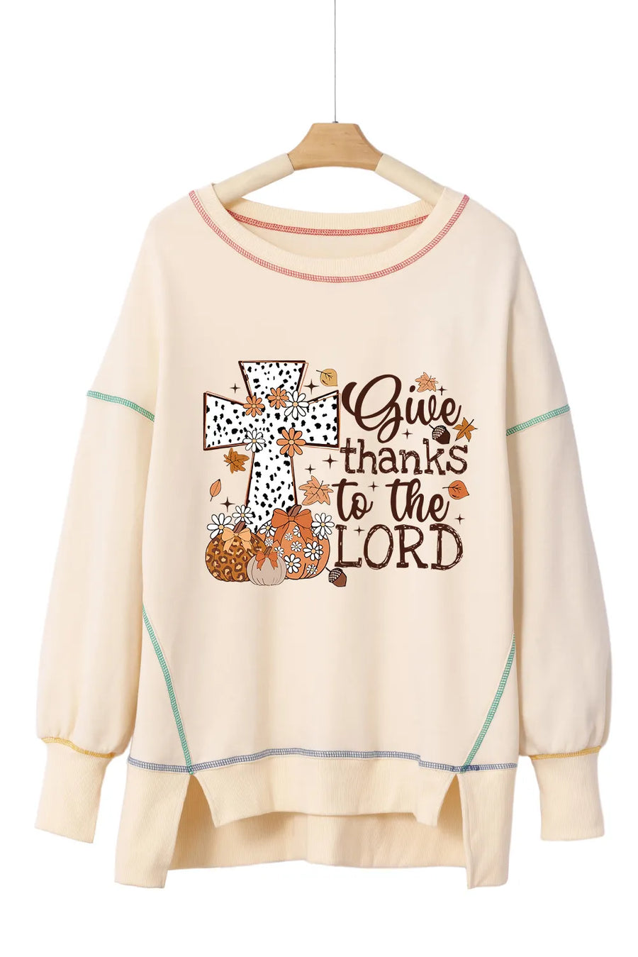 Beige graphic cross stitch sweatshirt with fall print and text.
