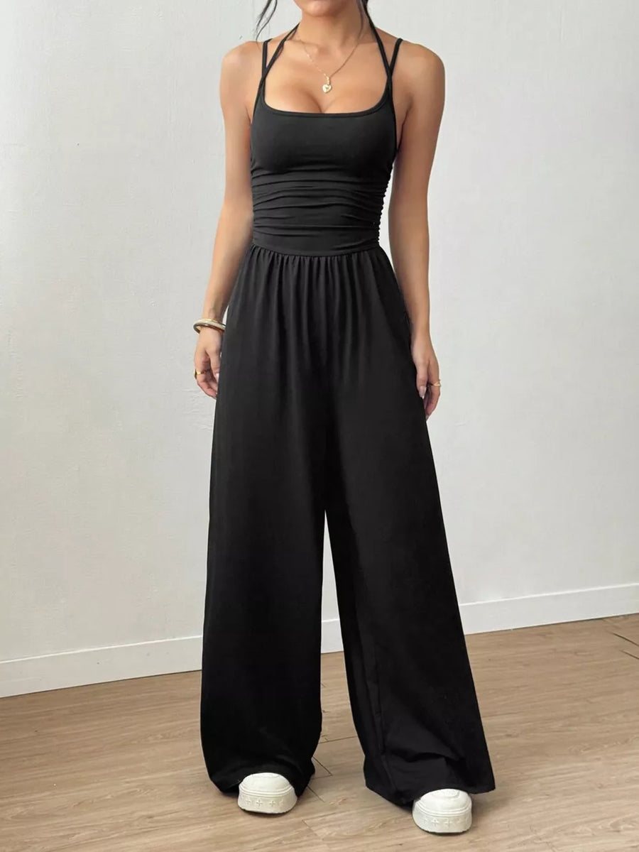 Black flared jumpsuit with square neck