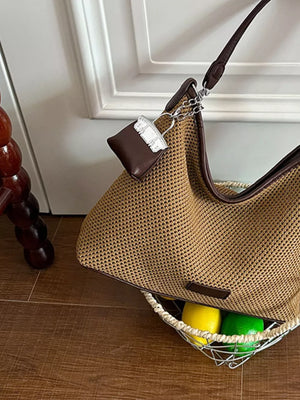 crossbody bag featuring striped in Yellow with Straw weaving Imported Size & texture