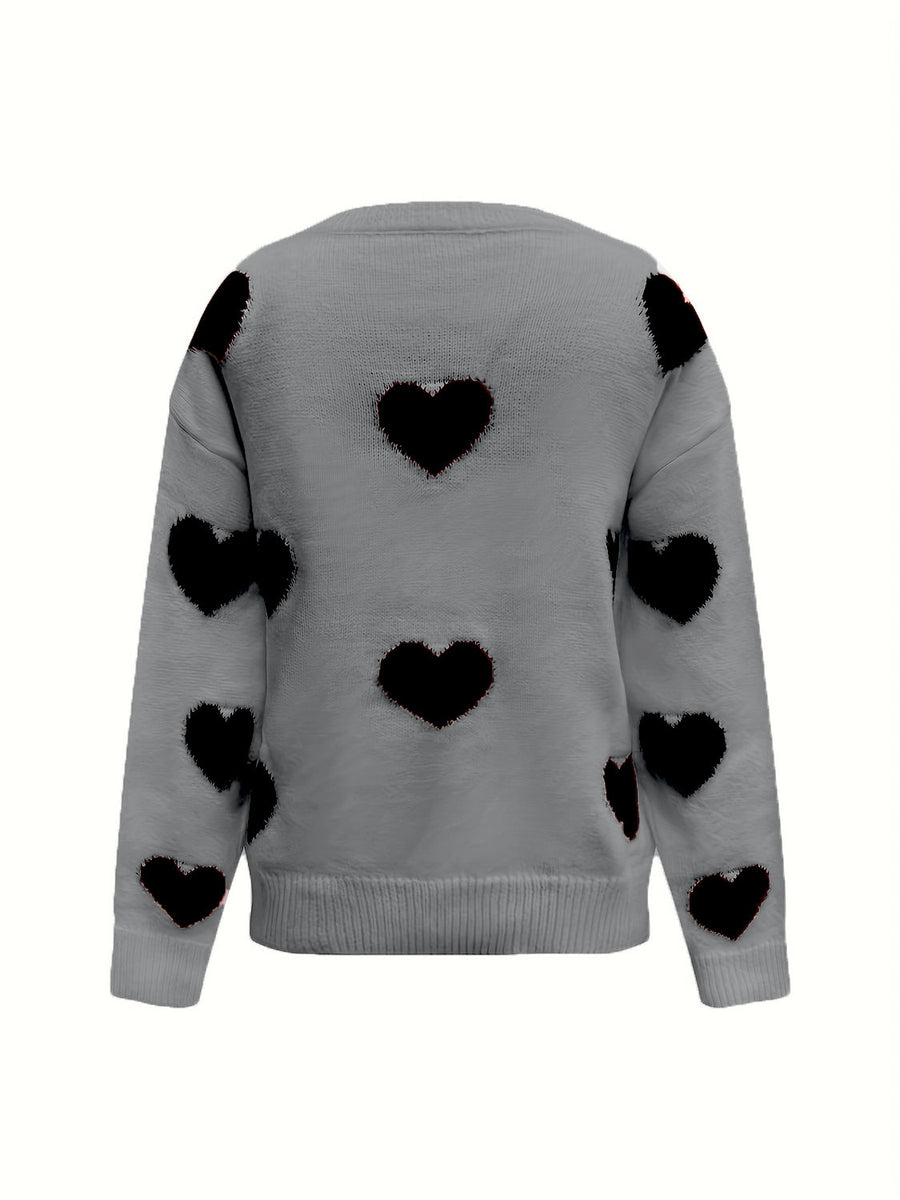 Gray oversized knit crewneck sweater with black heart pattern and drop sleeves.
