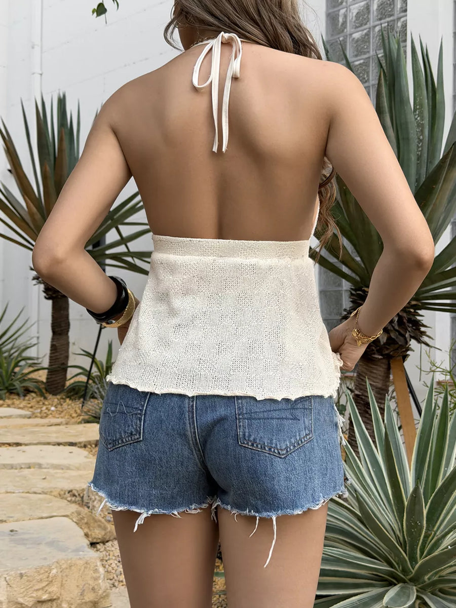 Iridescent shell-embellished halter cami with tie back, cropped knit style.
