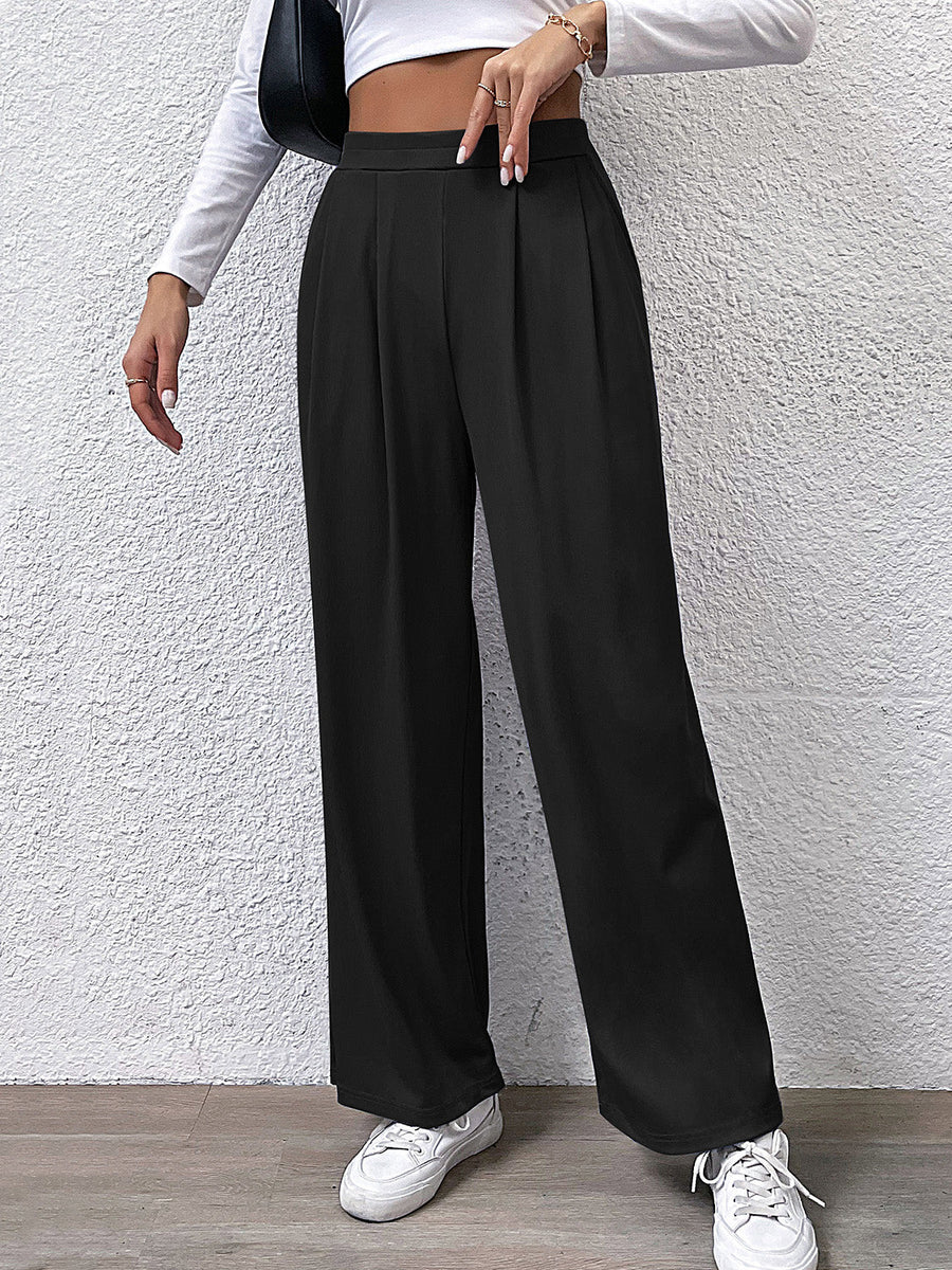 Black wide leg trousers with front pleats and a high waist.