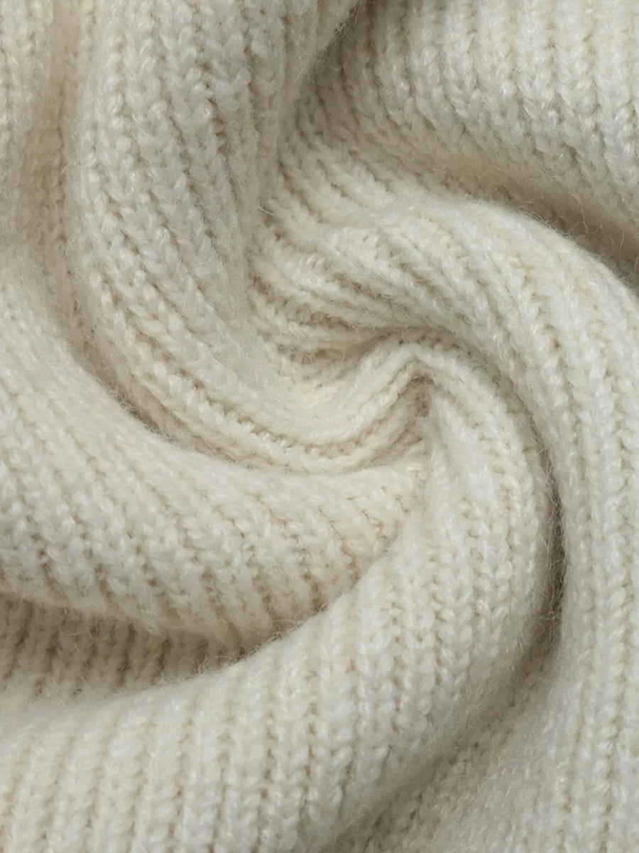 cream cardigan with open-front and four-leaf clover motif