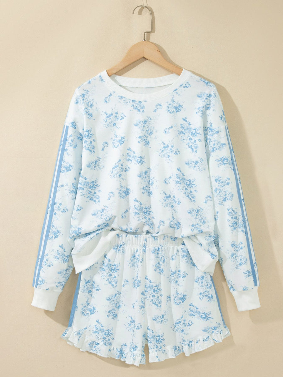 lounge set in light blue with floral and ruffled
