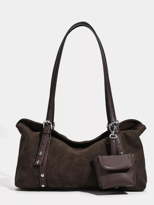 Brown suede medium shoulder bag with adjustable straps and a small attached pouch.