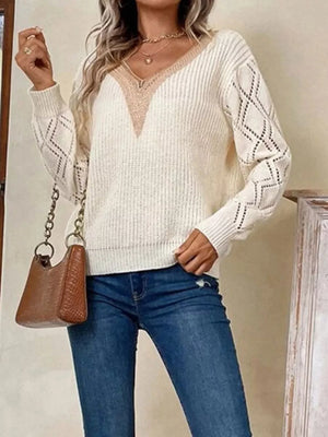 cream v-neck sweater with openwork and v-neck