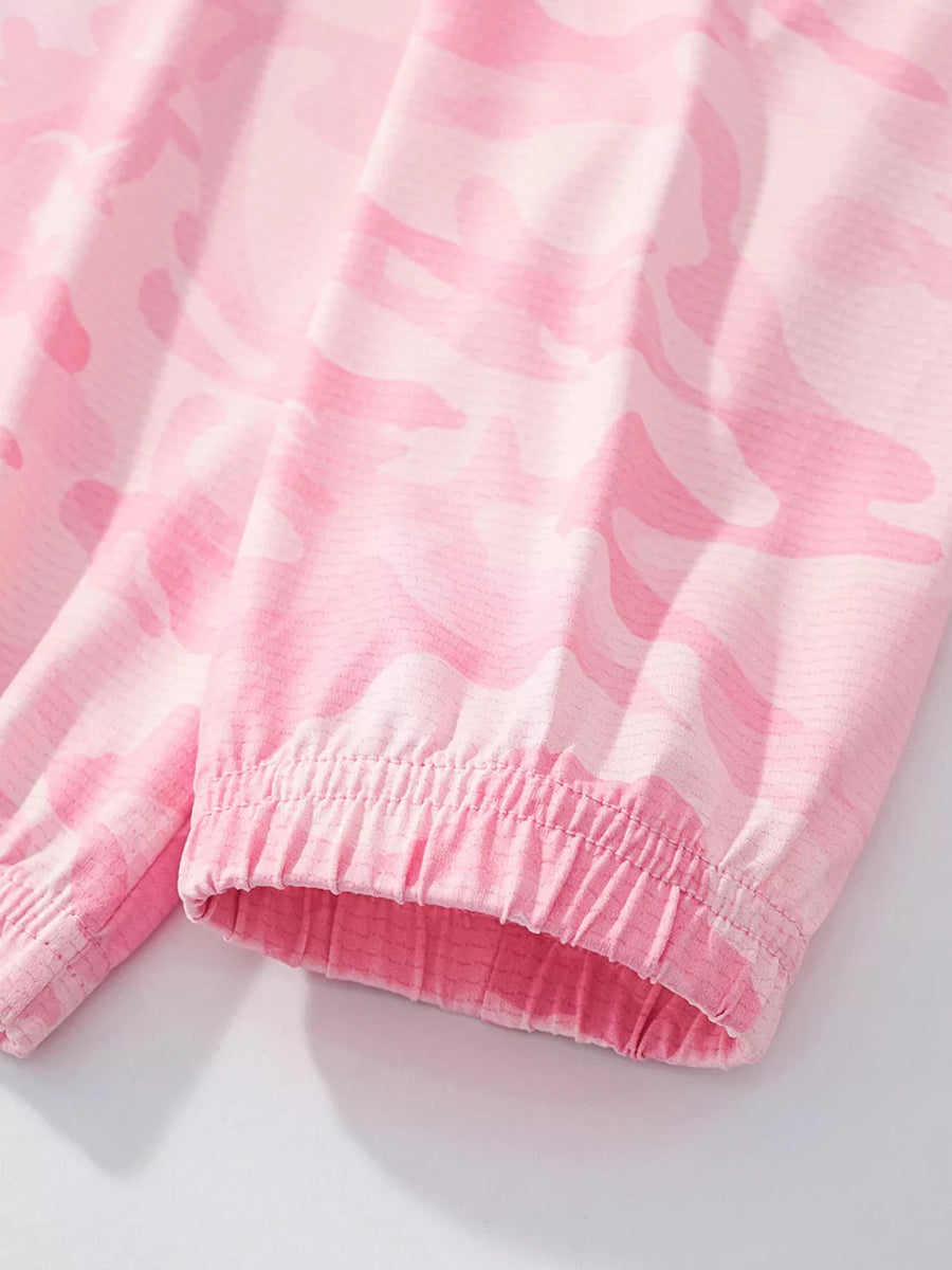 Lightweight pink camouflage hooded jacket for kids with elastic cuffs.