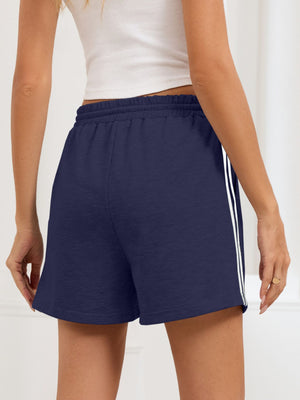 Navy heathered jogger shorts with white side trim and drawstring waist.