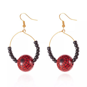 earrings featuring spiderweb in red with 18K Gold-Plated, Iron, Foam balls Care instructions: 1 texture