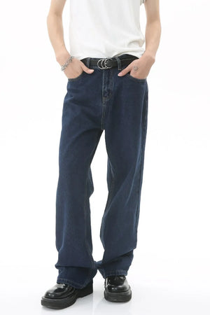 Baggy dark wash denim jeans with a subtle flare and casual styling.