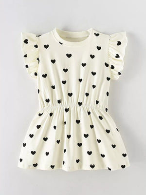 Children's cream a-line mini dress with black heart print and ruffle sleeves.