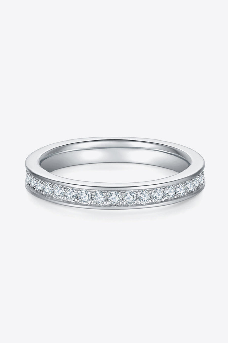 Silver pavé moissanite eternity band ring with 925 sterling silver setting.