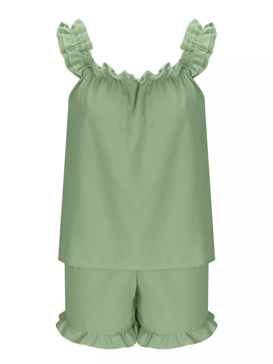 Light blue ruffled pajama set with elastic neckline and ruffle trim shorts.
