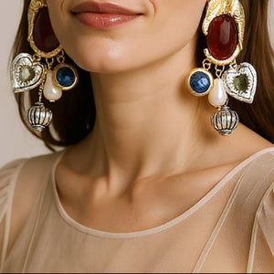 earrings in gold featuring dangle and dangle fit