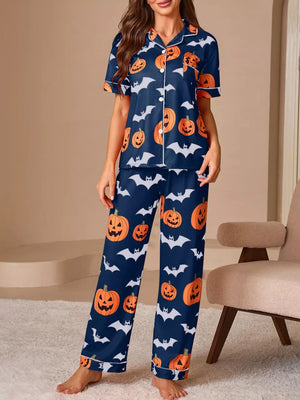orange pajama set featuring buttoned and novelty print