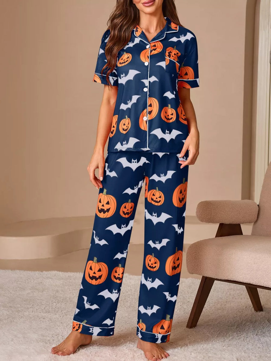 orange pajama set featuring buttoned and novelty print