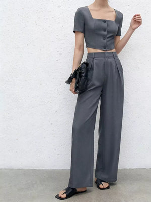 Chic square neck buttoned crop top and wide leg pants set in grey.