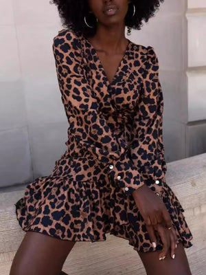 black mini dress featuring frill and leopard-print
