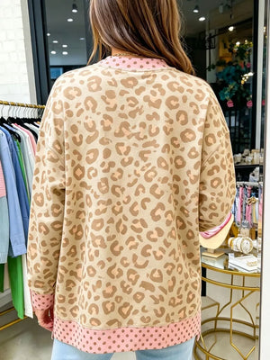 brown sweatshirt featuring side slit and leopard-print, polka-dot