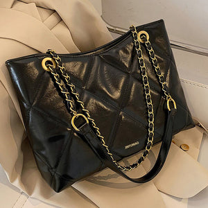Large black quilted PU leather shoulder bag with diamond pattern and gold chain straps