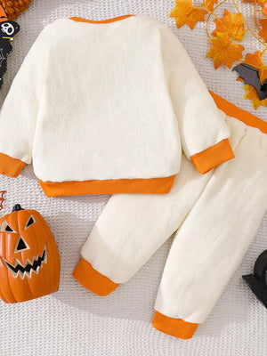pajama set featuring graphic-print in orange with 65% cotton, 35% polyester Care instructions: Machine wash cold texture