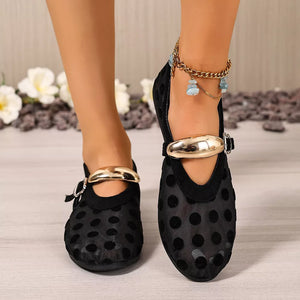slip-on flats in black featuring mesh upper and regular fit