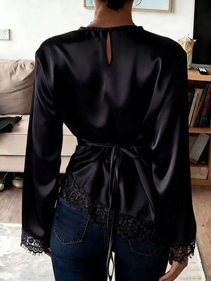 White relaxed blouse with round neck