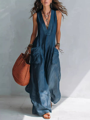jumpsuit in denim blue featuring pocketed and relaxed fit