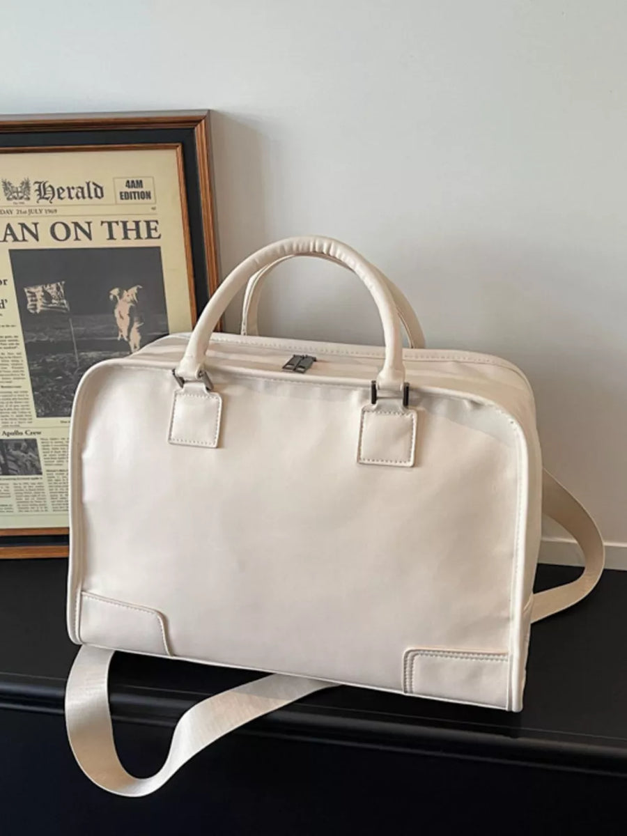 Cream pu leather travel bag with top handles and adjustable strap