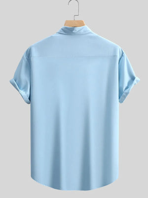 95%cotton, 5%spandex Care instructions: Machine wash cold button-up shirt in Pastel Blue with regular silhouette
