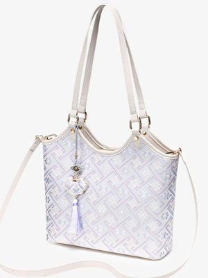 shoulder bag in lavender with geometric and shoulder straps