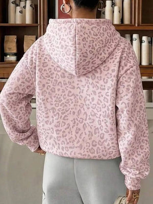 Leopard pullover hoodie featuring dropped shoulder and leopard