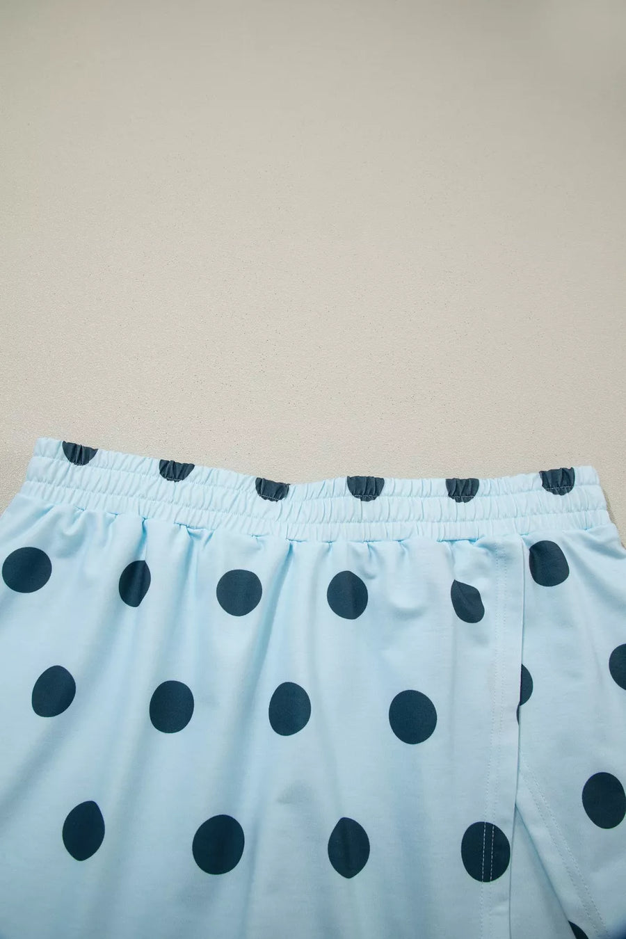 Pastel blue polka dot skort with elastic waistband