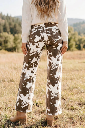 dark brown jeans featuring pocketed and abstract