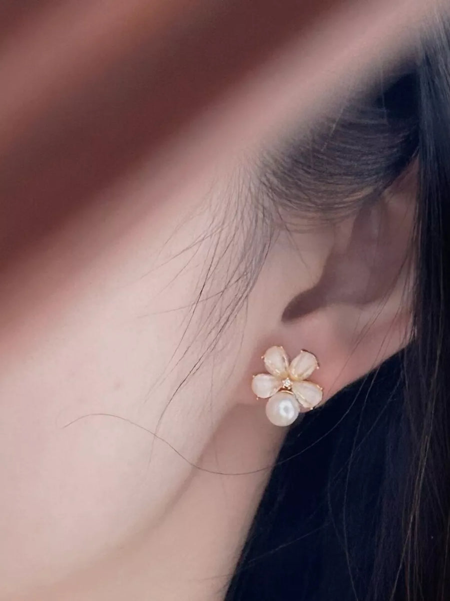 earrings in light pink with floral and pearl accent