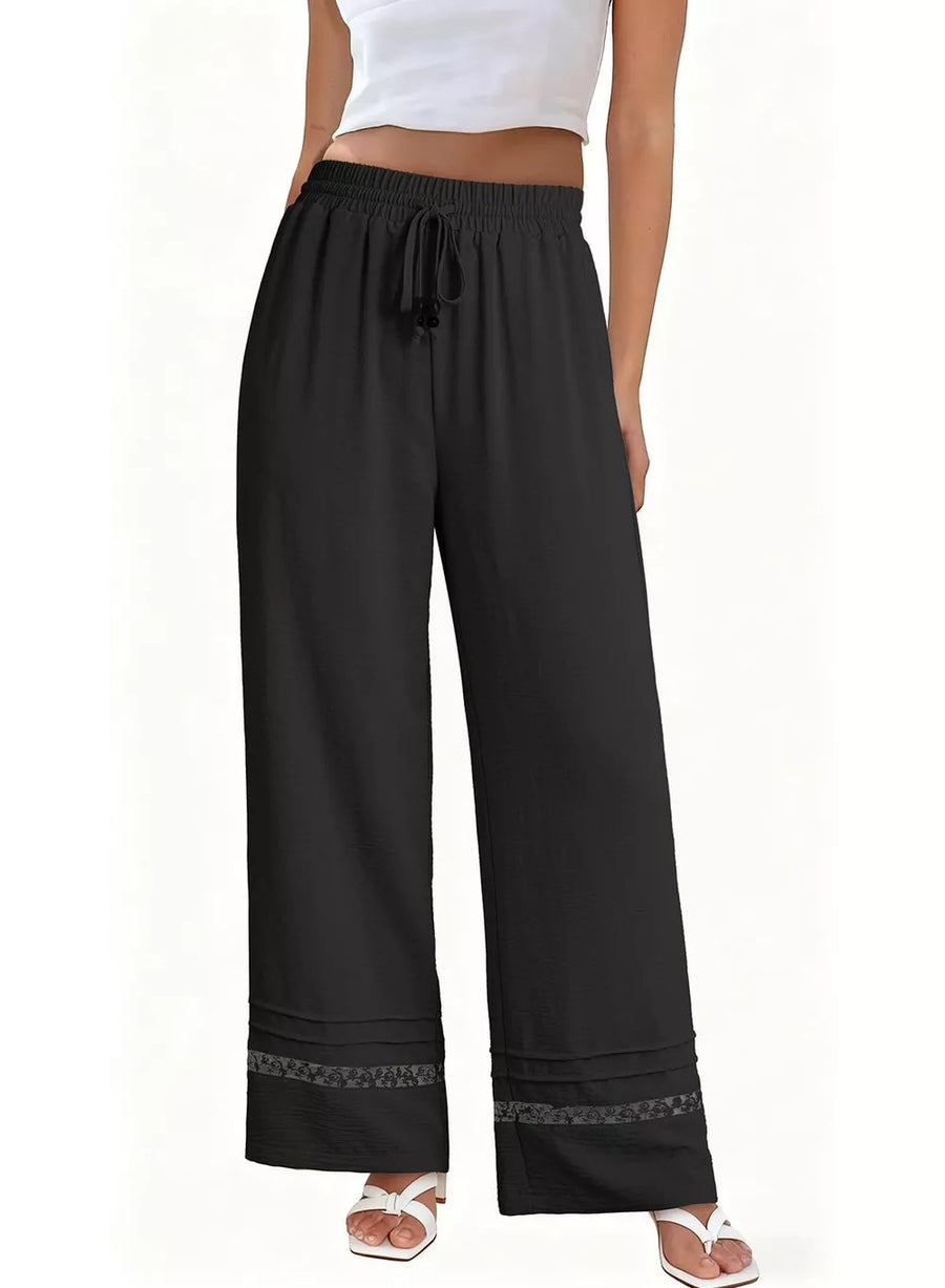 Black wide-leg maternity pants with drawstring and decorative hem detail