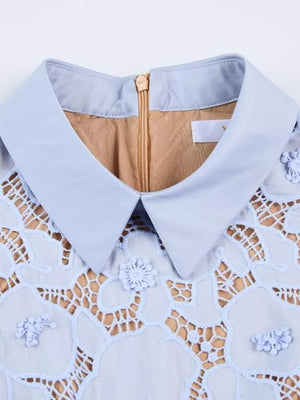 Sky blue lace midi dress with floral applique, peter pan collar, and zip detail.