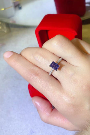 Radiant emerald-cut sapphire ring in 925 sterling silver with diamond accents.