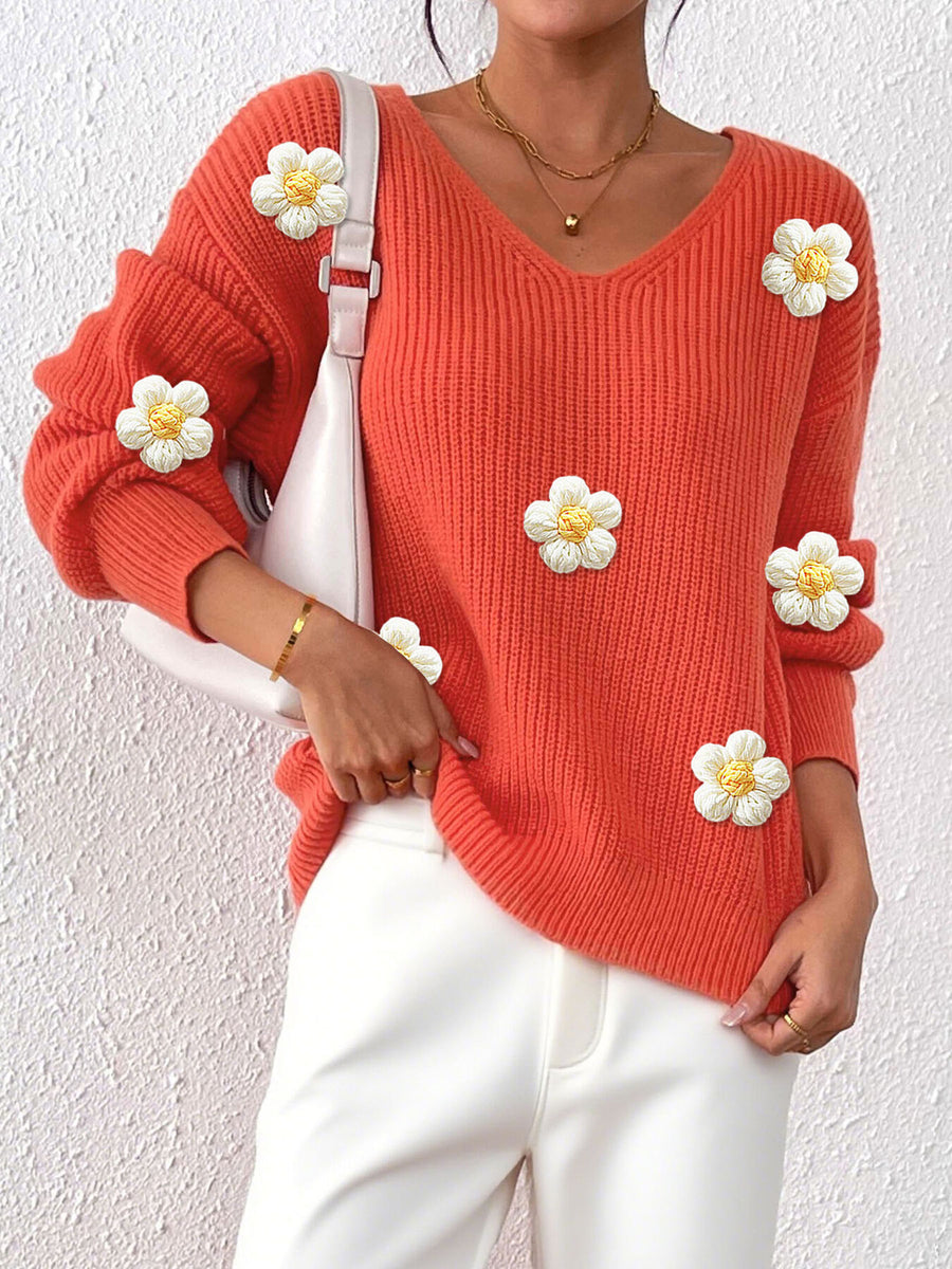 Black v-neck sweater with hip-length and pullover